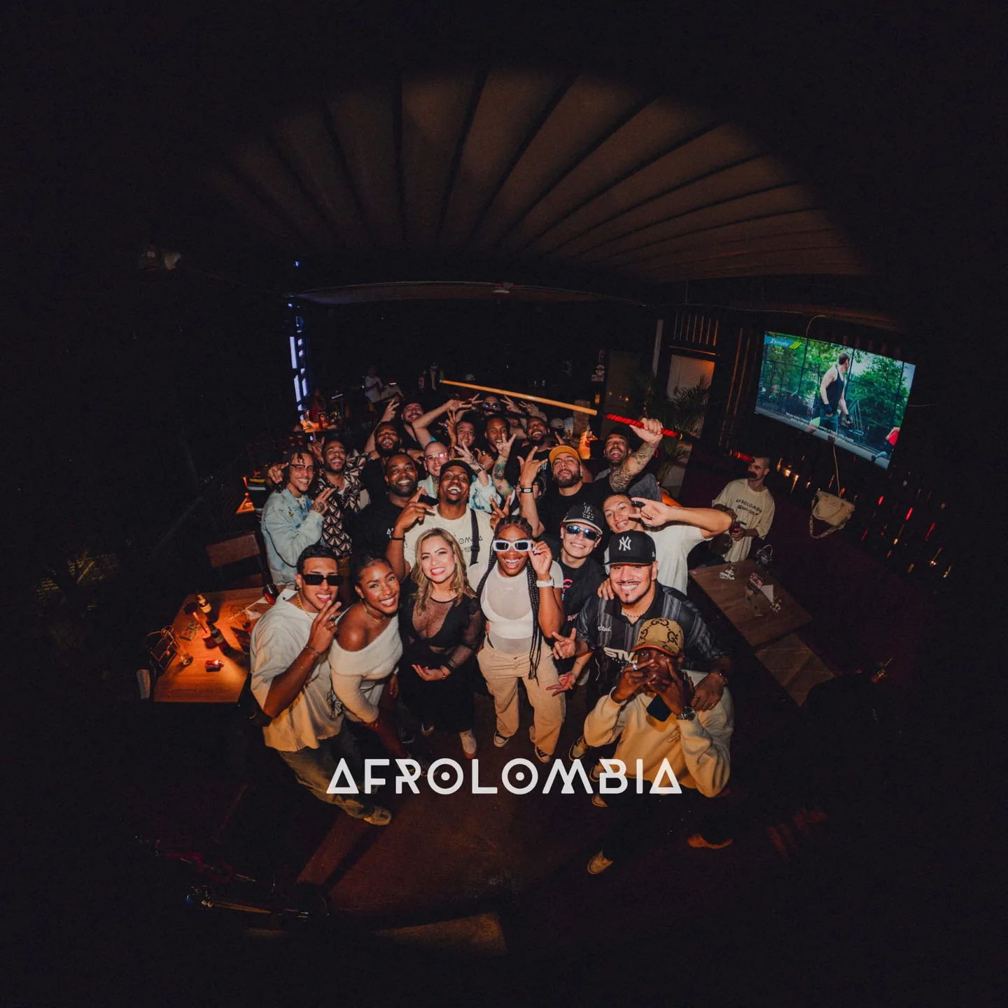 Marcus and the AFROLOMBIA crew together at a night event